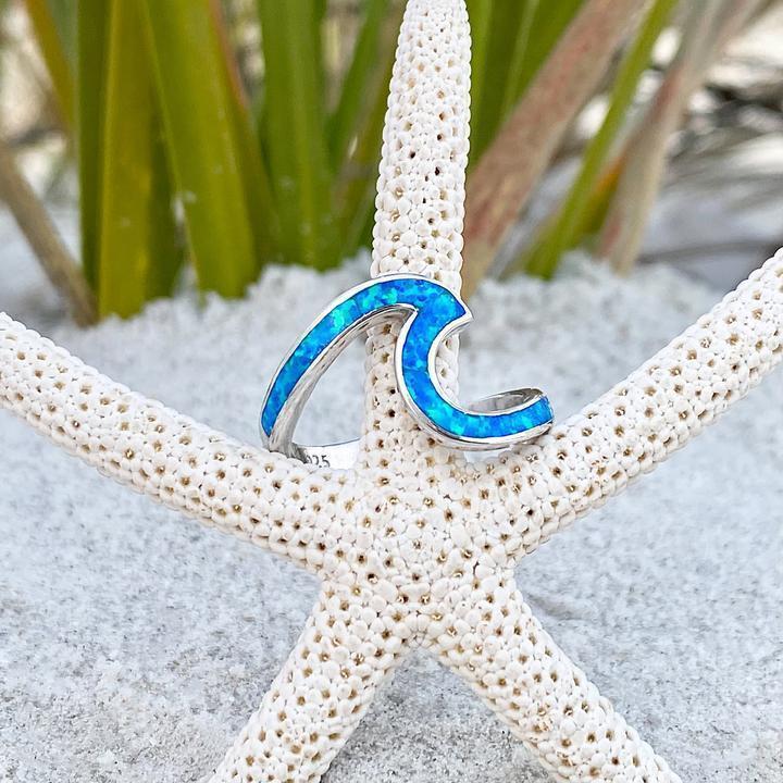 Silberner Wellenring mit blauem Opal
