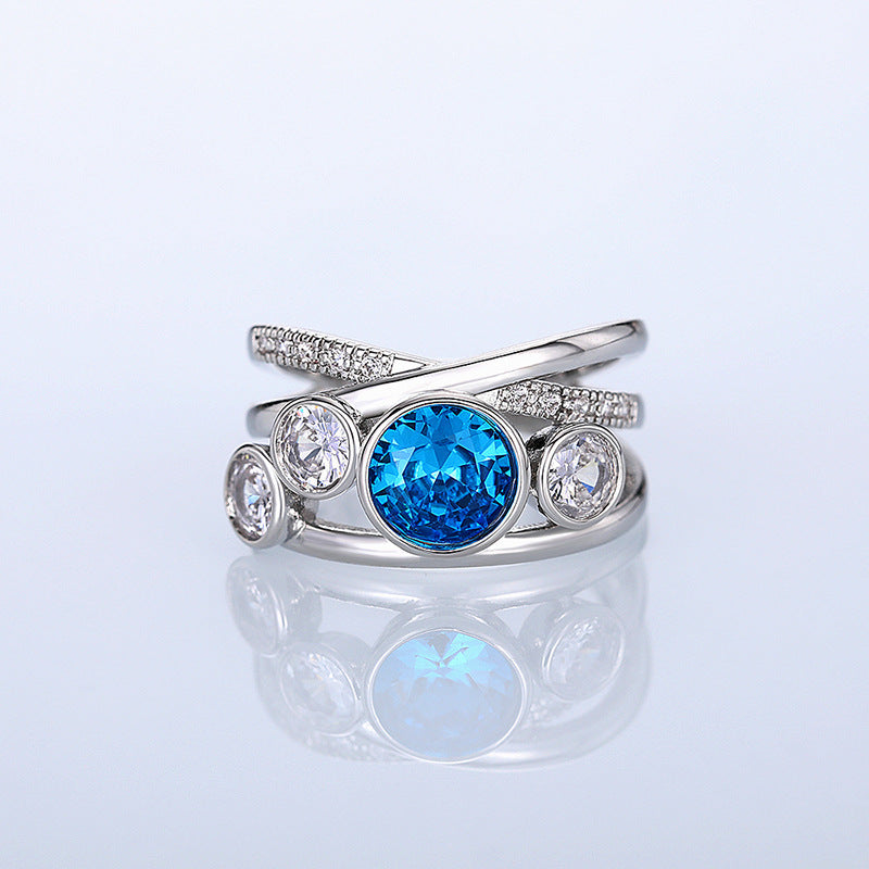 Blue Topaz Statement Ring with Split Band and Pavé Accents