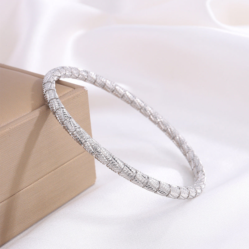 Betörendes verschlungenes Gold-Armband