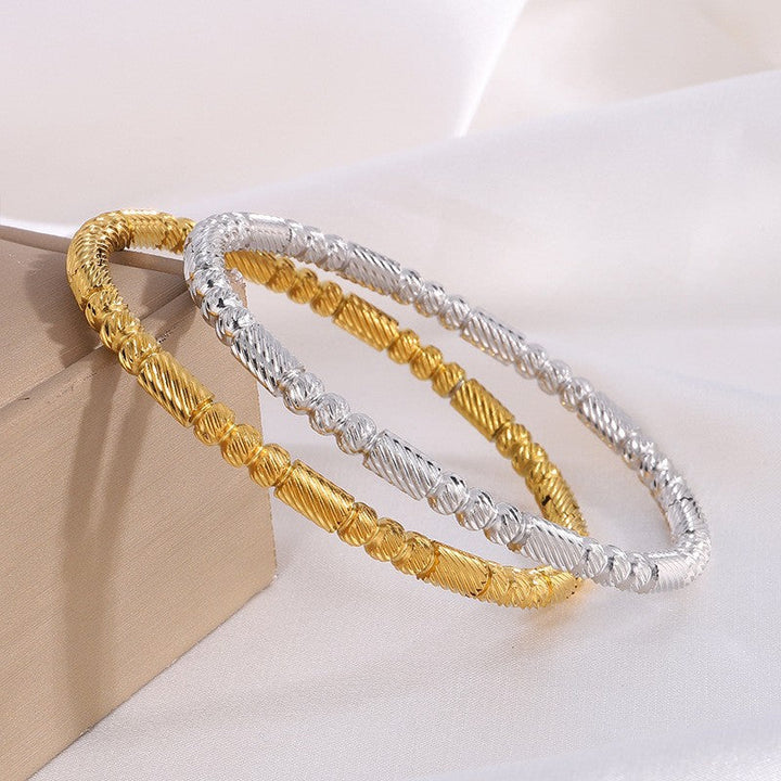 Betörendes verschlungenes Gold-Armband