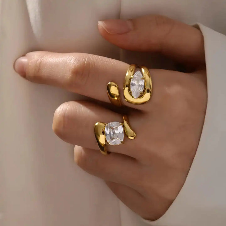 Zeitloser goldener Tropfen-Zirkonia-Ring