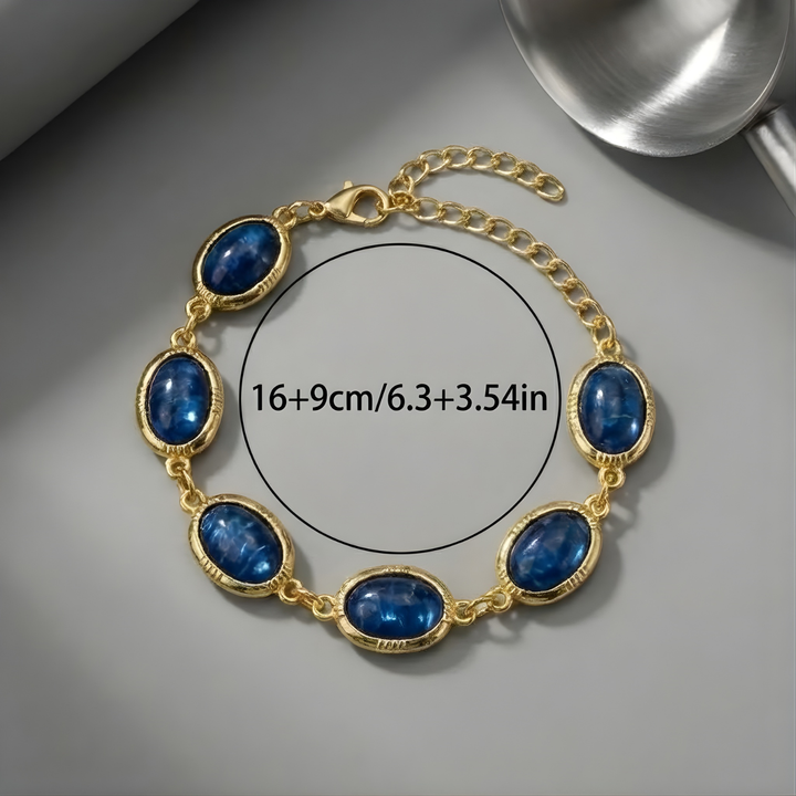 Charmantes Gold-Armband mit blauem Stein