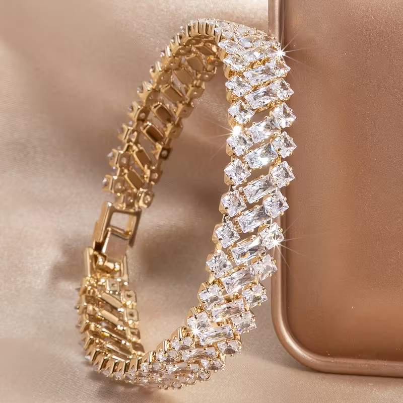 Elegantes luxuriöses Smaragd-Gold-Armband