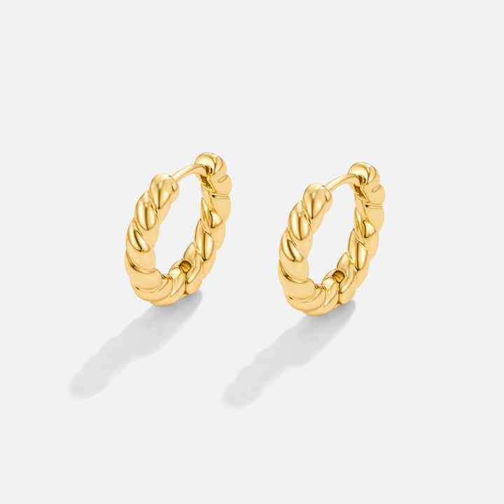 Gold-Ohrringe mit Twist